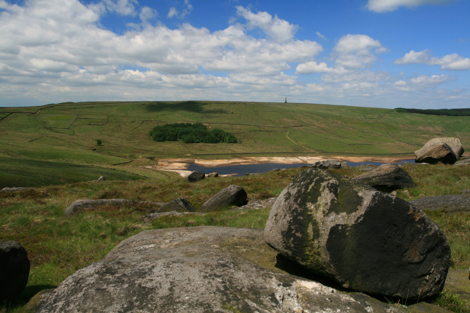 view of hills and a small lake at Turley Holes